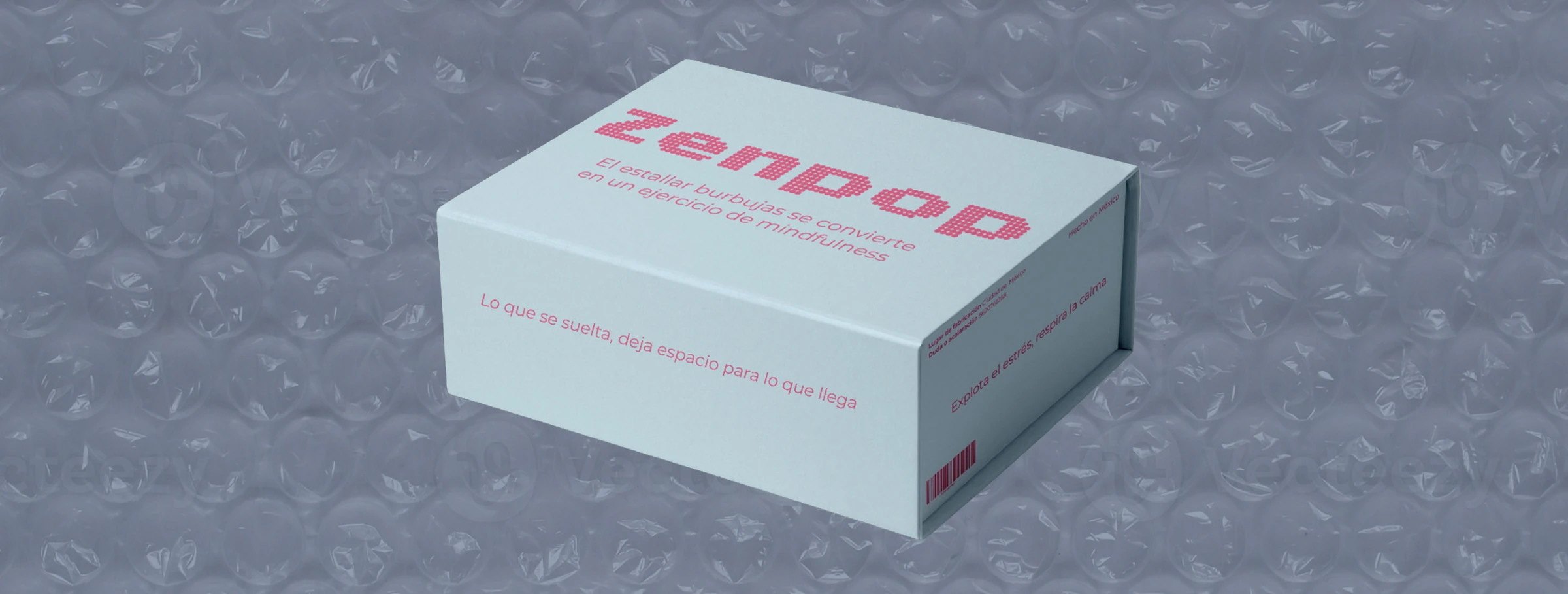 Caja de ZENPOP sobre plástico burbuja